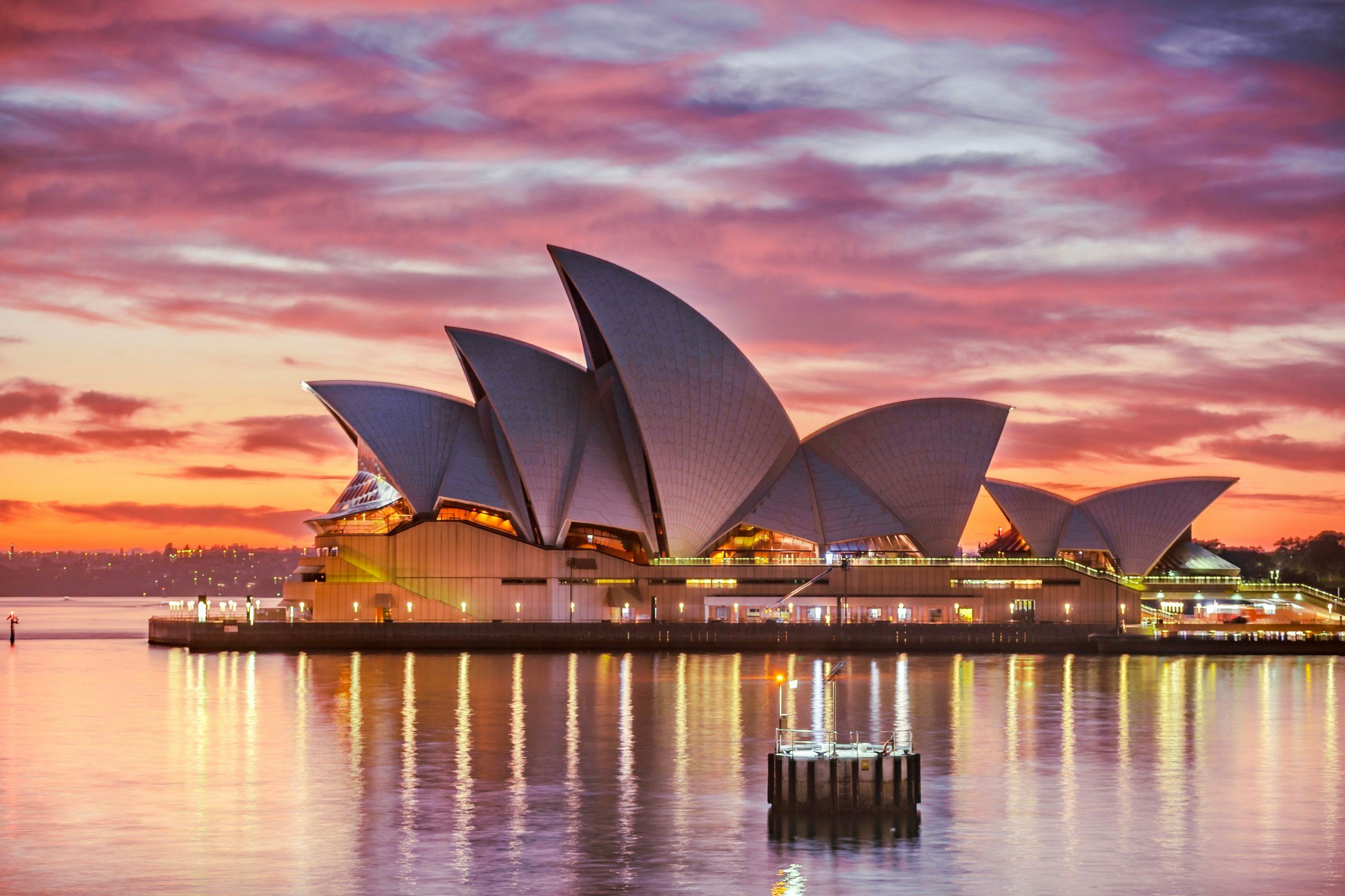 Sydney Opera House and harbour at dusk